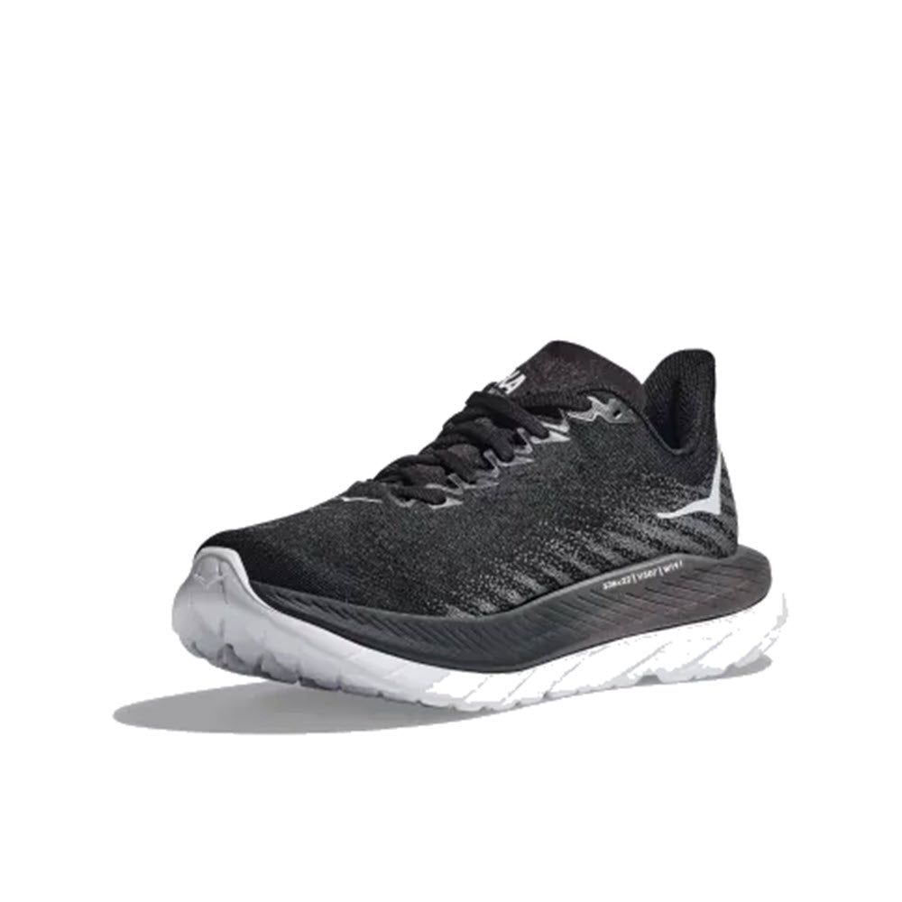 A black and white Hoka Mach 5 athletic running shoe displayed on a white background.