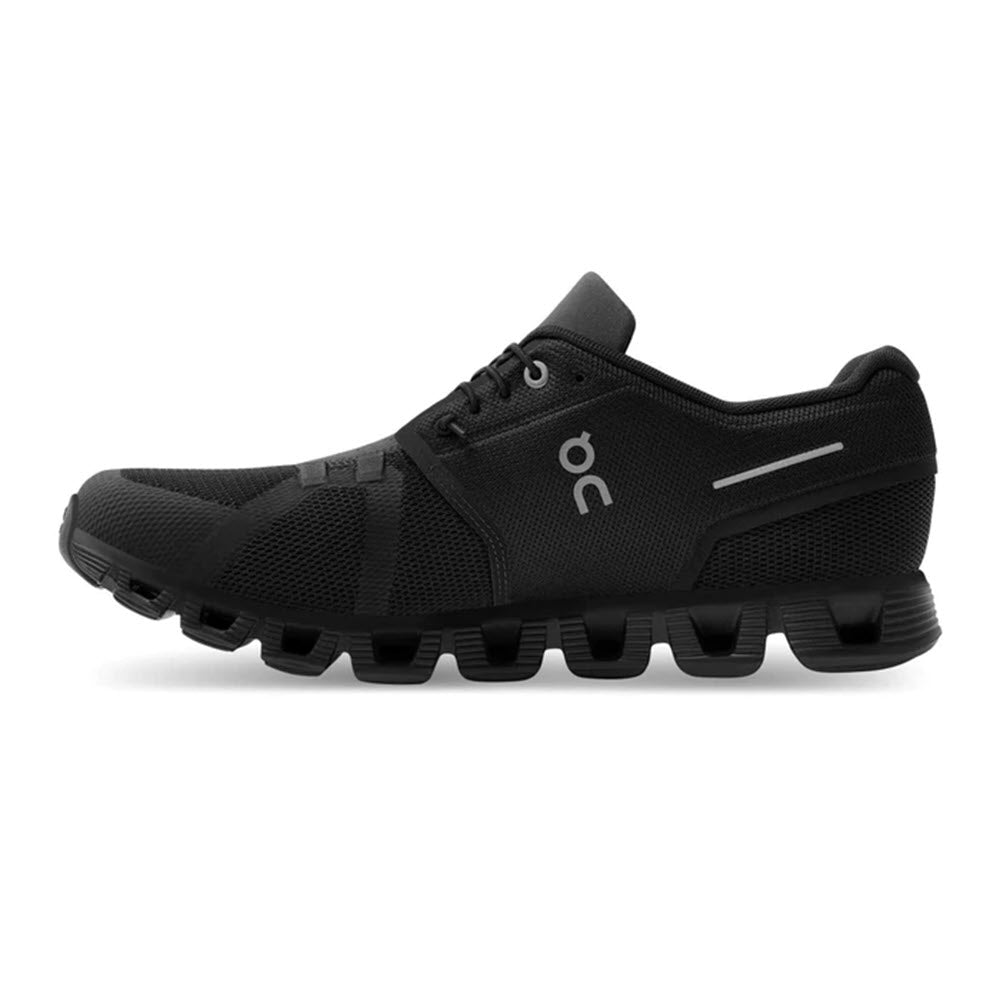 A single ON RUNNING CLOUD 5 ALL BLACK - MENS running shoe with a distinctive, segmented sole and a small white logo on the side, featuring a speed lacing system, displayed against a white background.