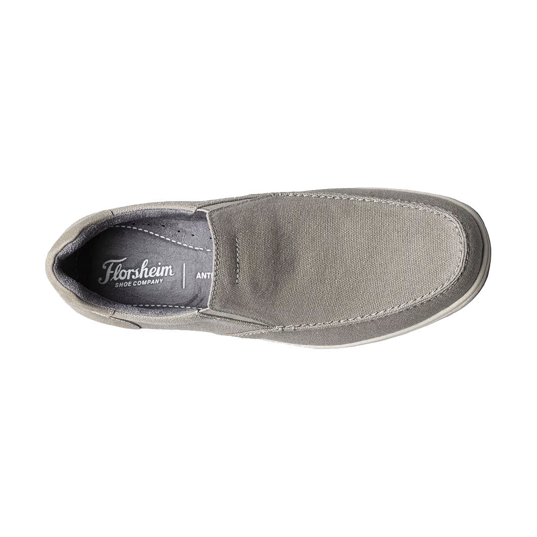 A single gray Florsheim FLORSHEIM LAKESIDE SLIP ON CANVAS STONE - MENS shoe viewed from above.