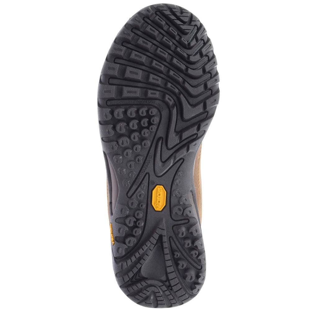 Bottom view of a leather hiking shoe sole featuring a textured, durable Merrell Vibram tread pattern with distinct black rubber and small yellow details.