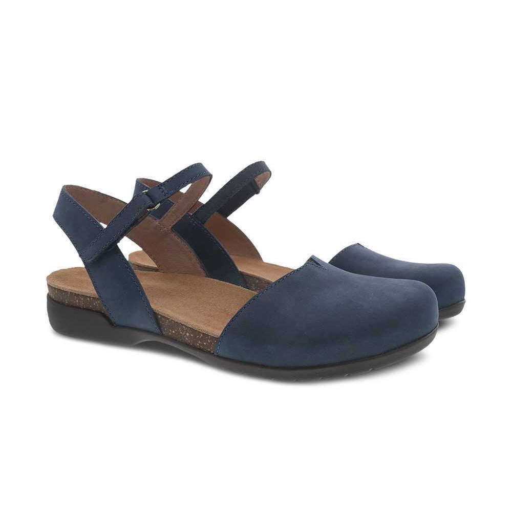 A pair of Dansko Rowan Navy women&#39;s summer sandals with a closed toe and adjustable straps.