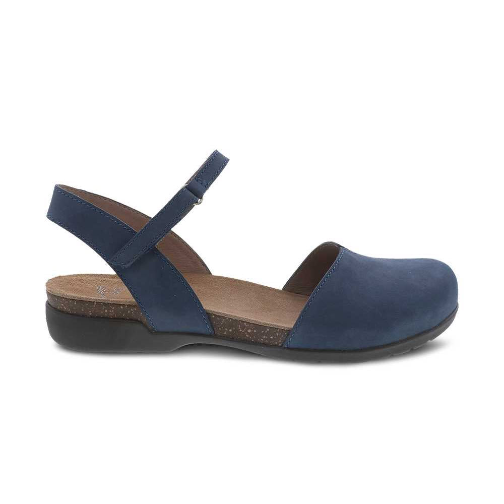 A single Dansko Rowan Navy summer sandal with crossed straps and a small wedge heel, isolated on a white background.