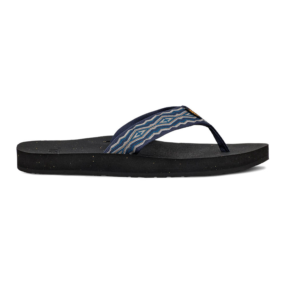 A single Teva sandal with a black sole and a blue patterned strap against a white background.
