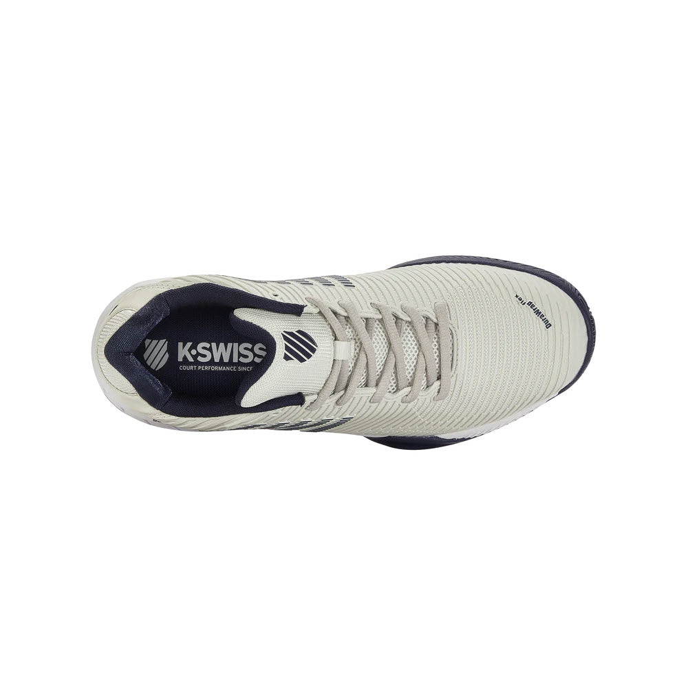 Top view of a beige K-Swiss Hypercourt Express 2 Vaporous Gray/Peacoat sneaker with white laces and navy blue accents on the tongue and inner lining.