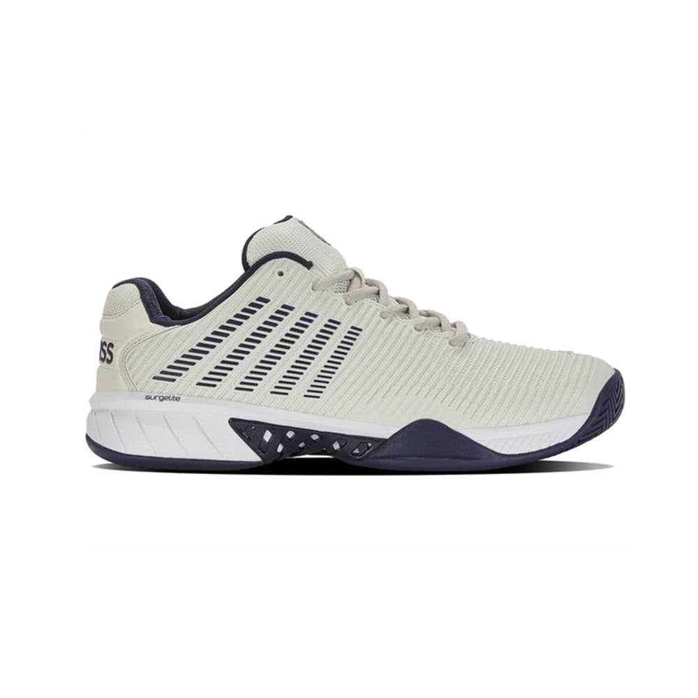 Side view of a K-Swiss Hypercourt Express 2 Vaporous Gray/Peacoat tennis shoe with navy accents and a cushioned sole, displayed on a white background.
