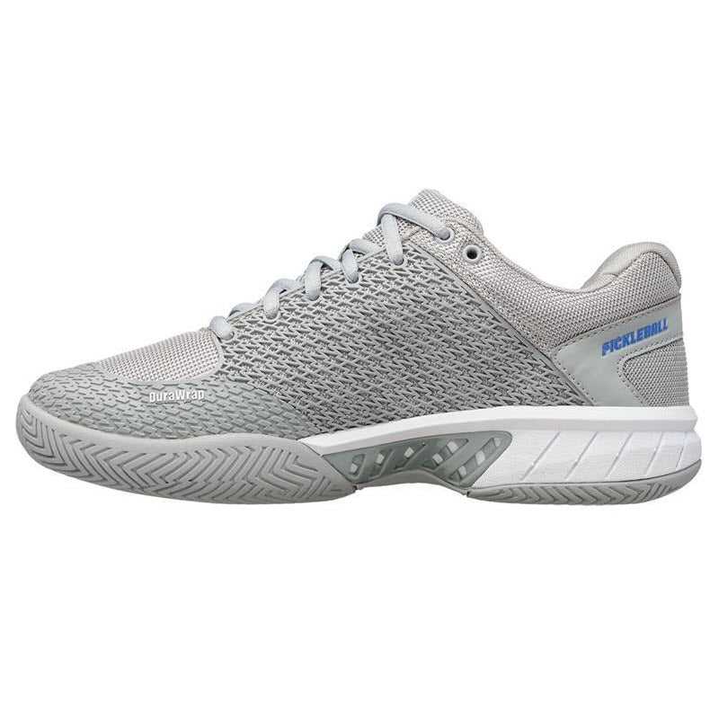 Side view of a gray athletic shoe with the word &quot;pickleball&quot; on the heel, designed for sport with a patterned sole and heel grip lining - K-Swiss Express Light Pickleball - Womens.