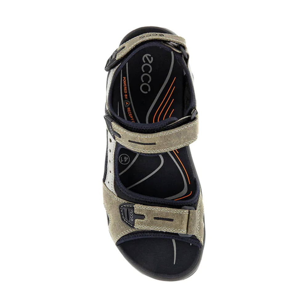 Top view of a single Ecco Yucatan sandal with hook and loop straps, featuring a dark insole and beige outer material with orange and white accents.
