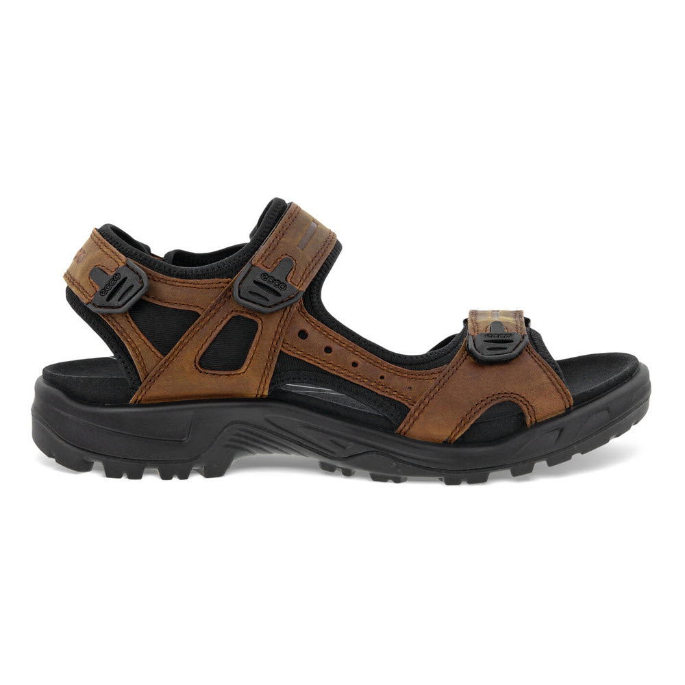 A pair of brown and black men&#39;s Ecco Yucatan M Plus Sierra sandals with adjustable straps on a white background.