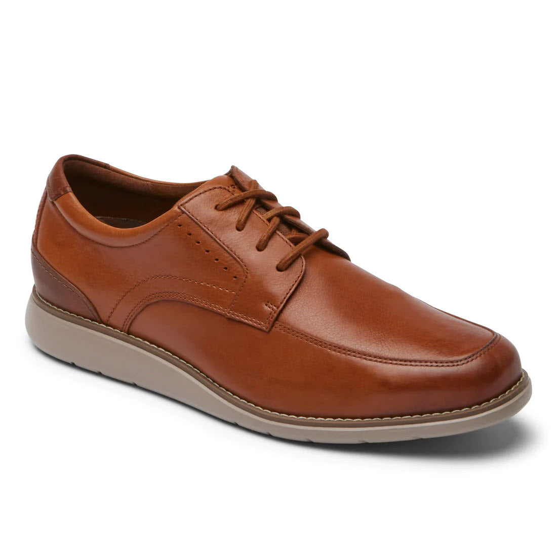 A single brown leather Rockport Total Motion Craft apron toe cognac men&#39;s dress shoe with laces, displayed on a white background.
