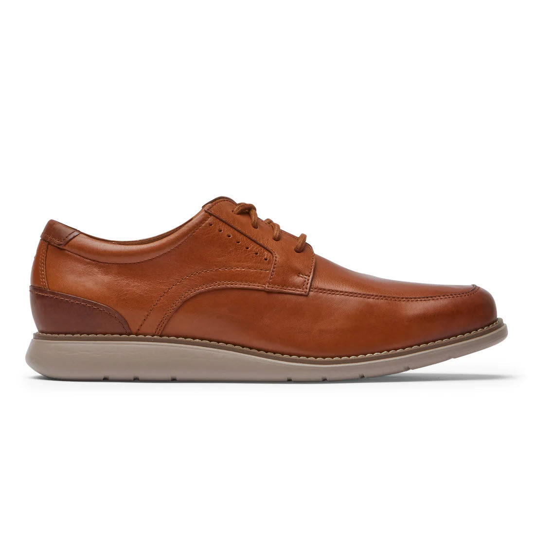 A single brown leather Rockport Total Motion Craft men&#39;s dress shoe with laces on a white background.