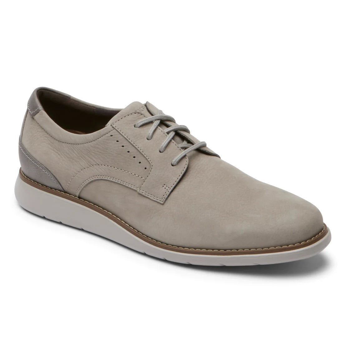 A single Rockport Total Motion Craft Plain Toe Taupe men&#39;s dress shoe with leather uppers and laces on a white background.