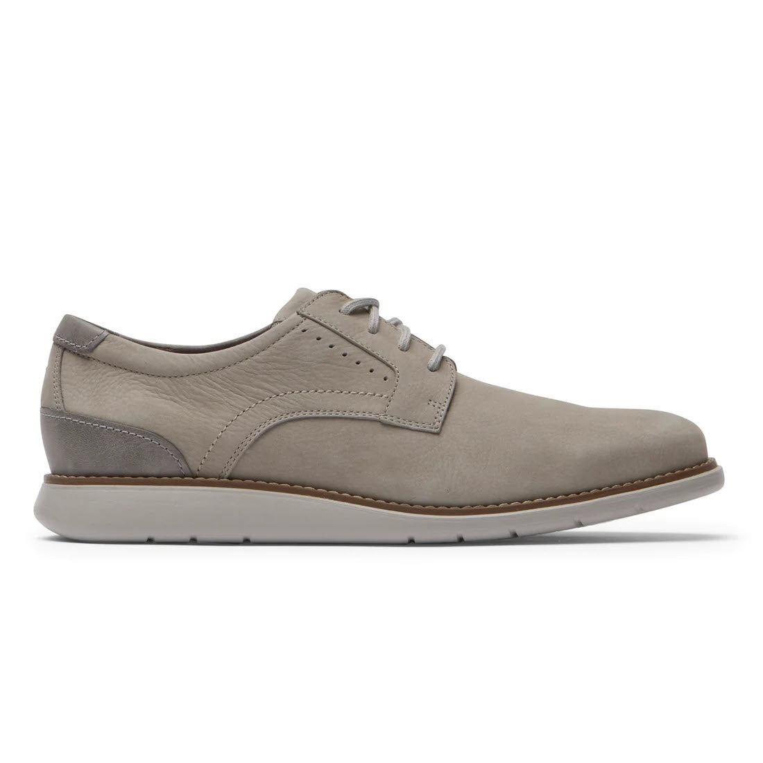 A single grey men&#39;s Rockport Total Motion Craft Plain Toe Taupe oxford shoe with lace-up closure, featuring stitching details and a light brown IMEVA sole.