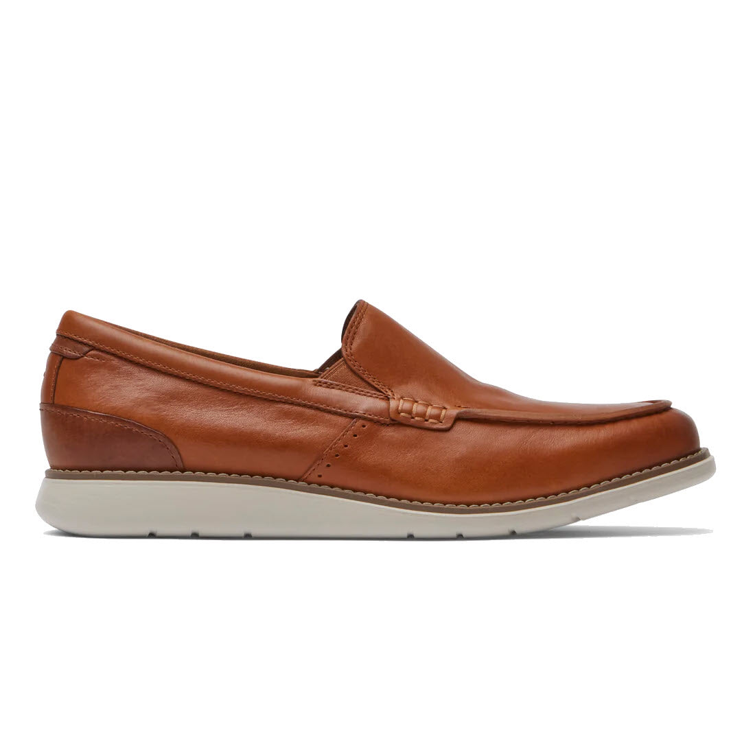A Rockport Total Motion Craft Venetian Cognac loafer with a white sole, displayed against a plain white background.
