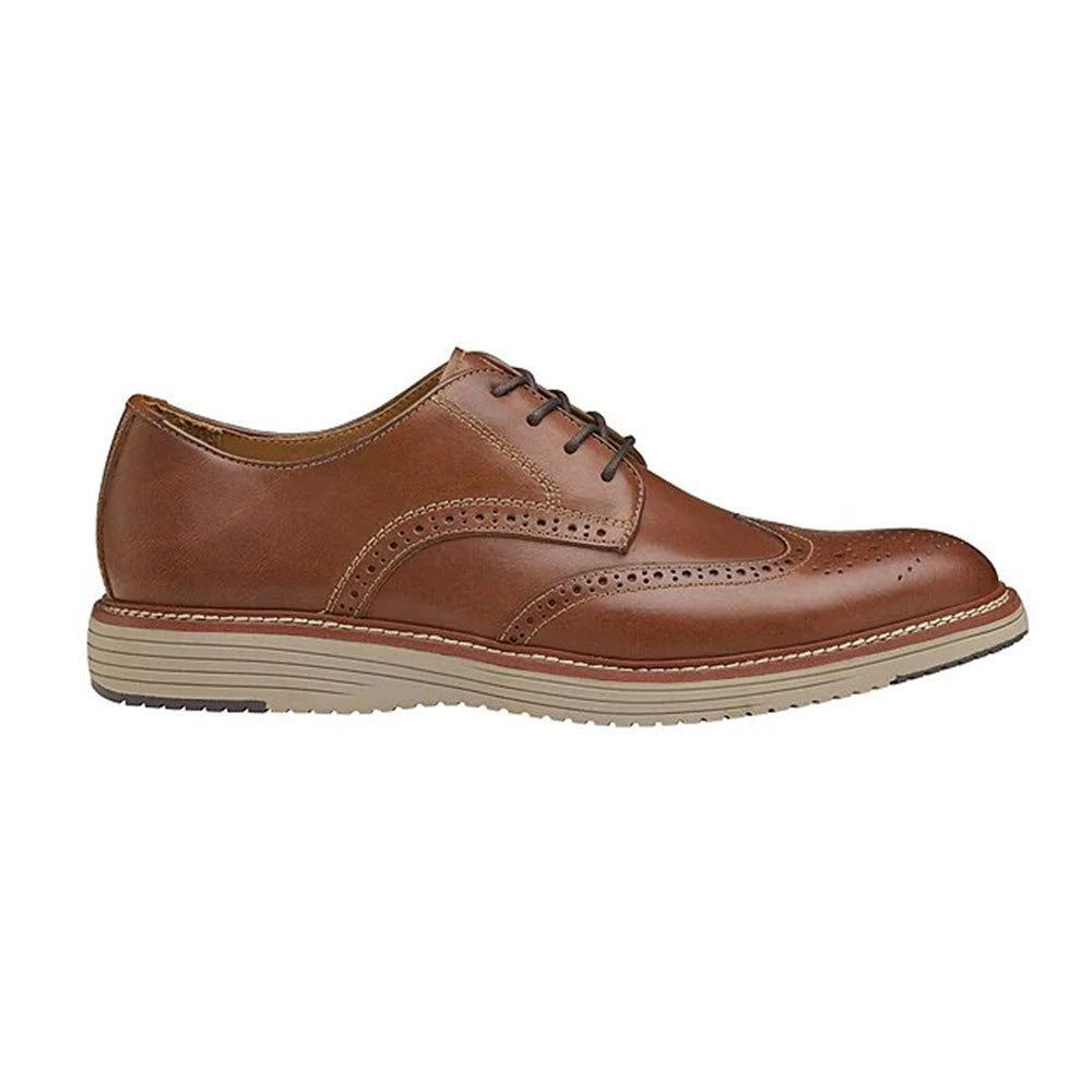 A single Johnston &amp; Murphy Upton Wingtip Tan brogue shoe with decorative perforations and a TRUFOAM memory foam footbed, shown against a white background.