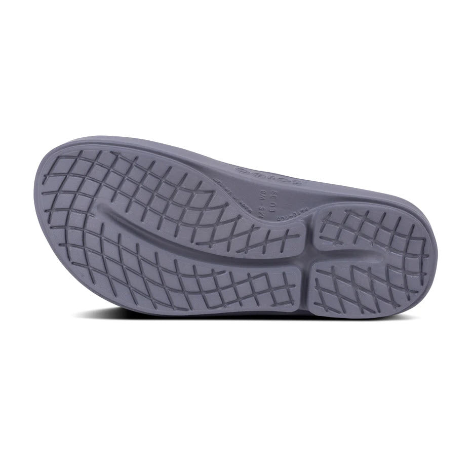 Sole of a gray OOFOS OOriginal Slate flip-flop sandal with a herringbone pattern and size marking visible.