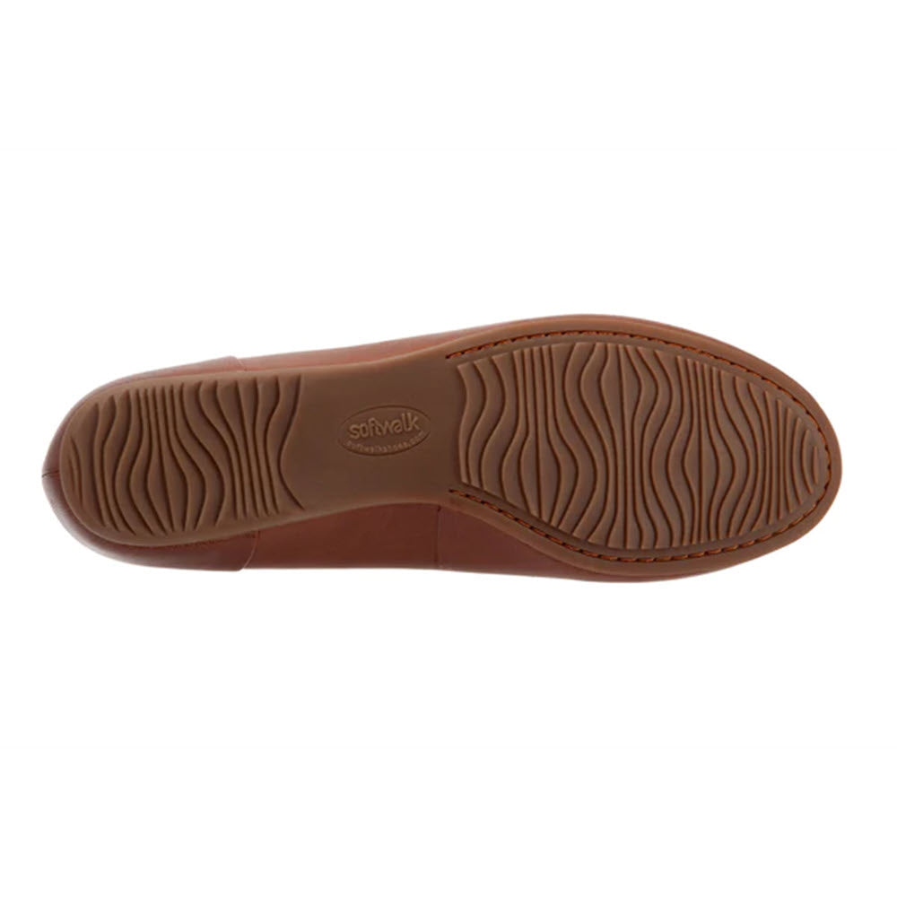 A close-up image of the brown rubber sole of a Softwalk Shiraz Cognac Women&#39;s flat shoe, featuring a wavy tread pattern and embossed with the brand name &quot;Softwalk.