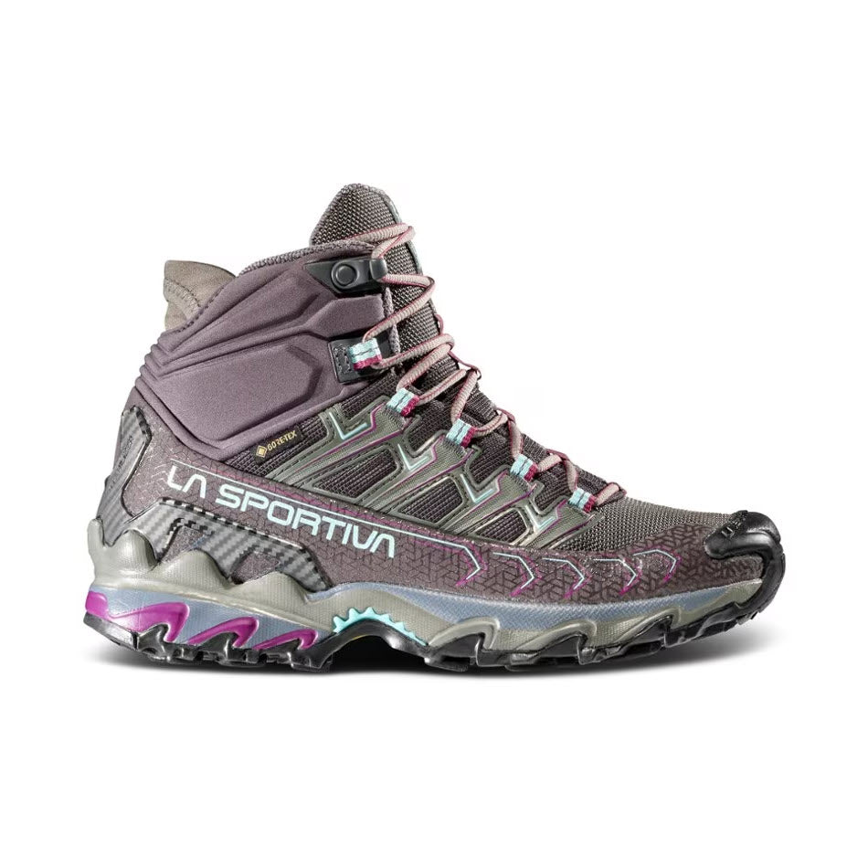 A single La Sportiva LA SPORTIVA ULTRA RAPTOR II MID GTX CARBON/ICEBERG hiking boot with high ankle support featuring gray, purple, and pink details against a white background.