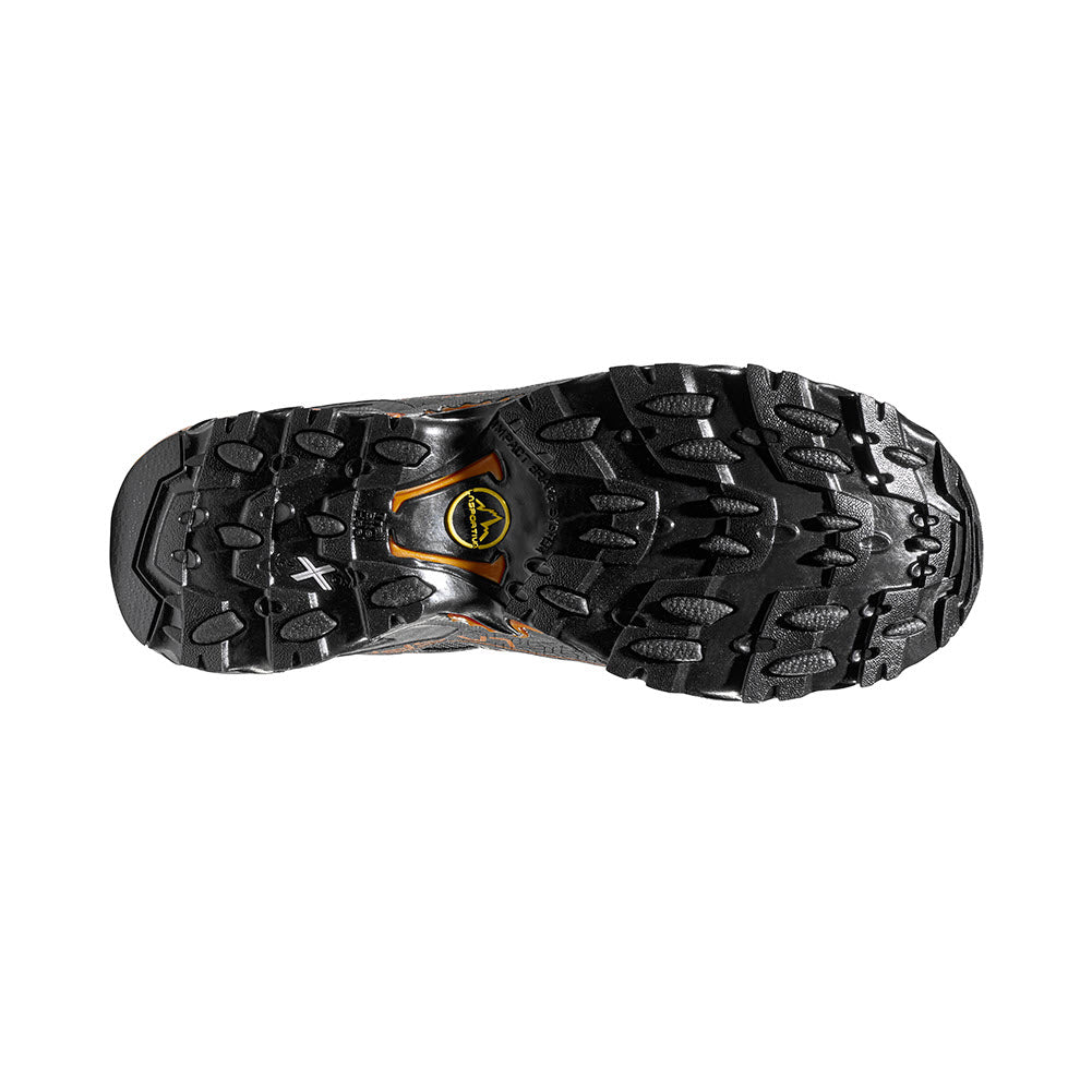 Bottom view of a black La Sportiva Ultra Raptor II Carbon/Hawaiian Sun - Mens mountain running shoe with intricate tread pattern and visible brand logos.