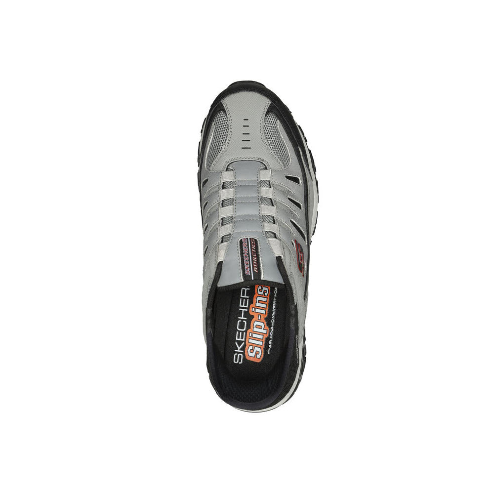 Top view of a gray Skechers ARCH FIT Slip-ins sneaker with visible brand logos and a contrast black lining.