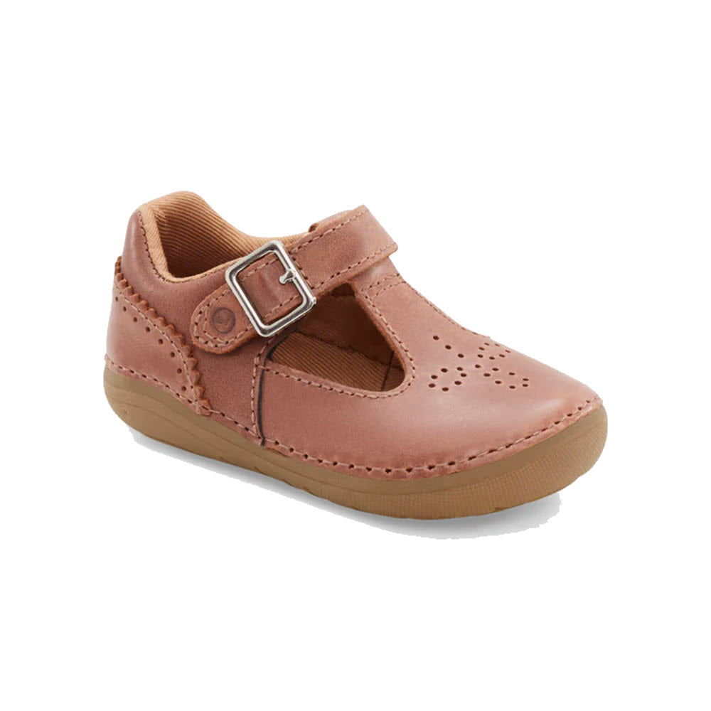 A single pink leather Stride Rite Mary Jane shoe with a hook and loop closure and decorative perforations on a white background.