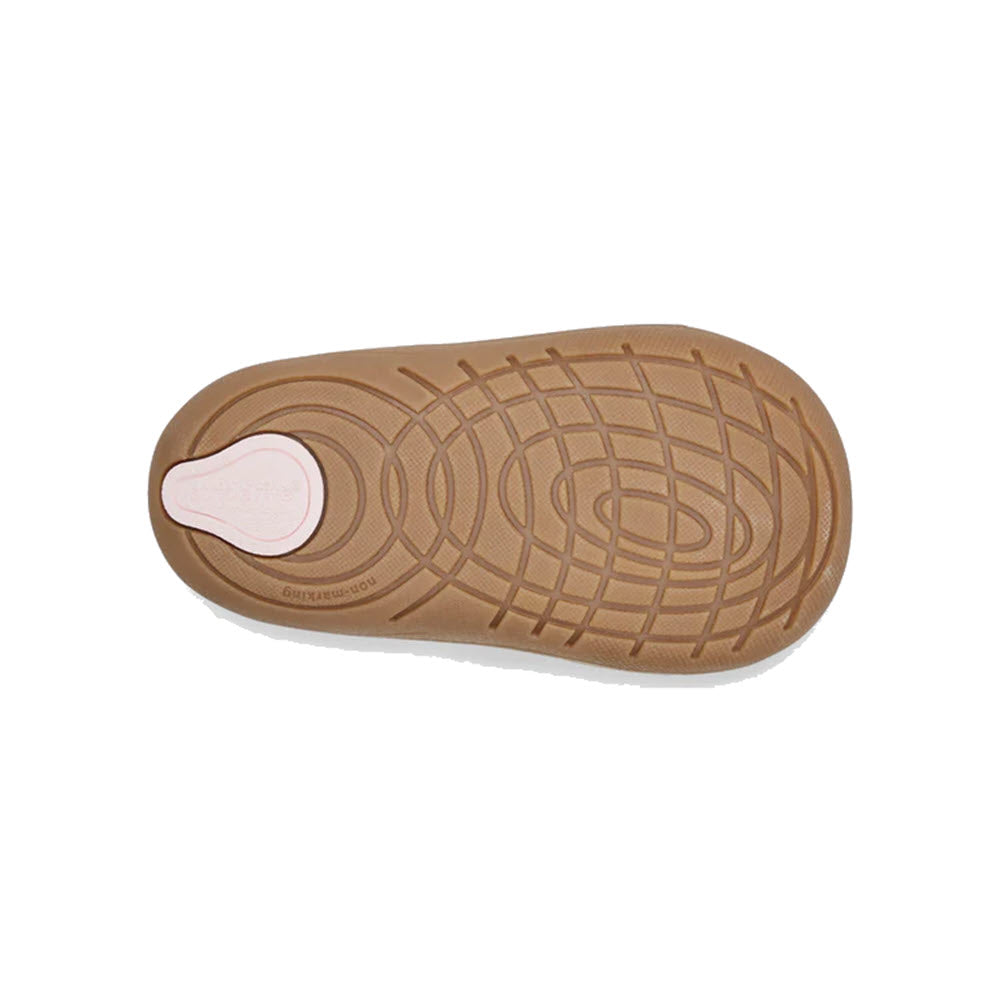 A bottom view of a leather shoe sole with a textured pattern and a pink accent in the heel area of the Stride Rite SM Lucianne Sierra - Toddlers shoe.