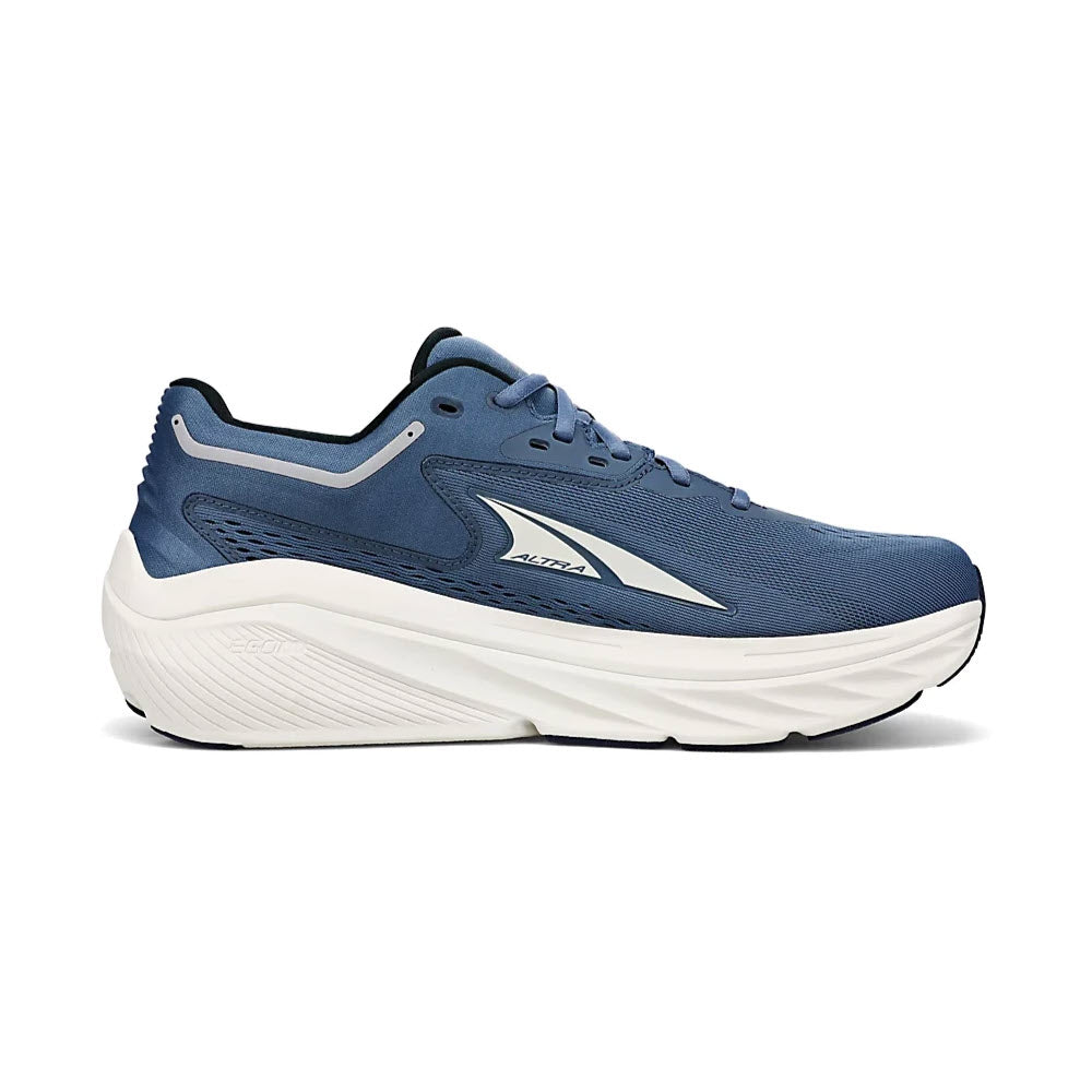 A side view of a blue Altra Via Olympus Mineral Blue running shoe with white soles, featuring a prominent white logo on the side.
