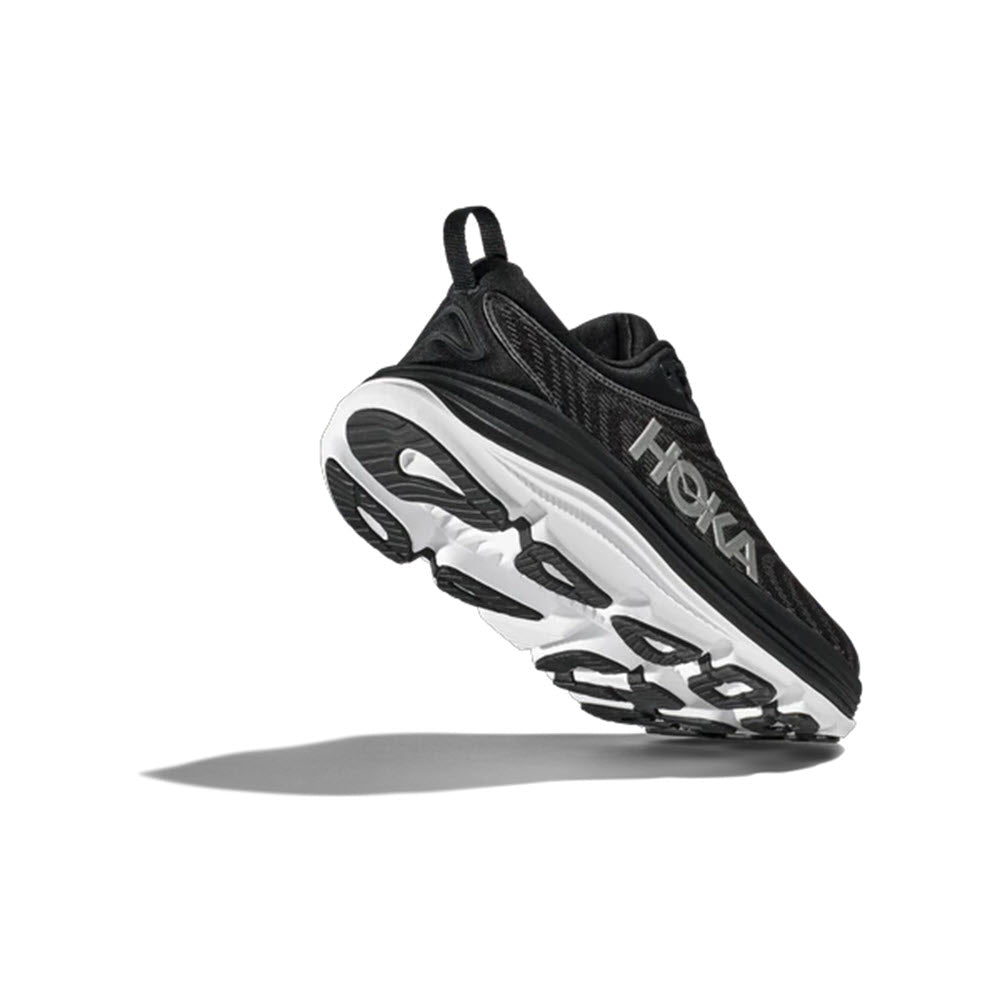 A black and white HOKA GAVIOTA 5 stability shoe with a thick sole and H-Frame™ technology, displayed against a white background.