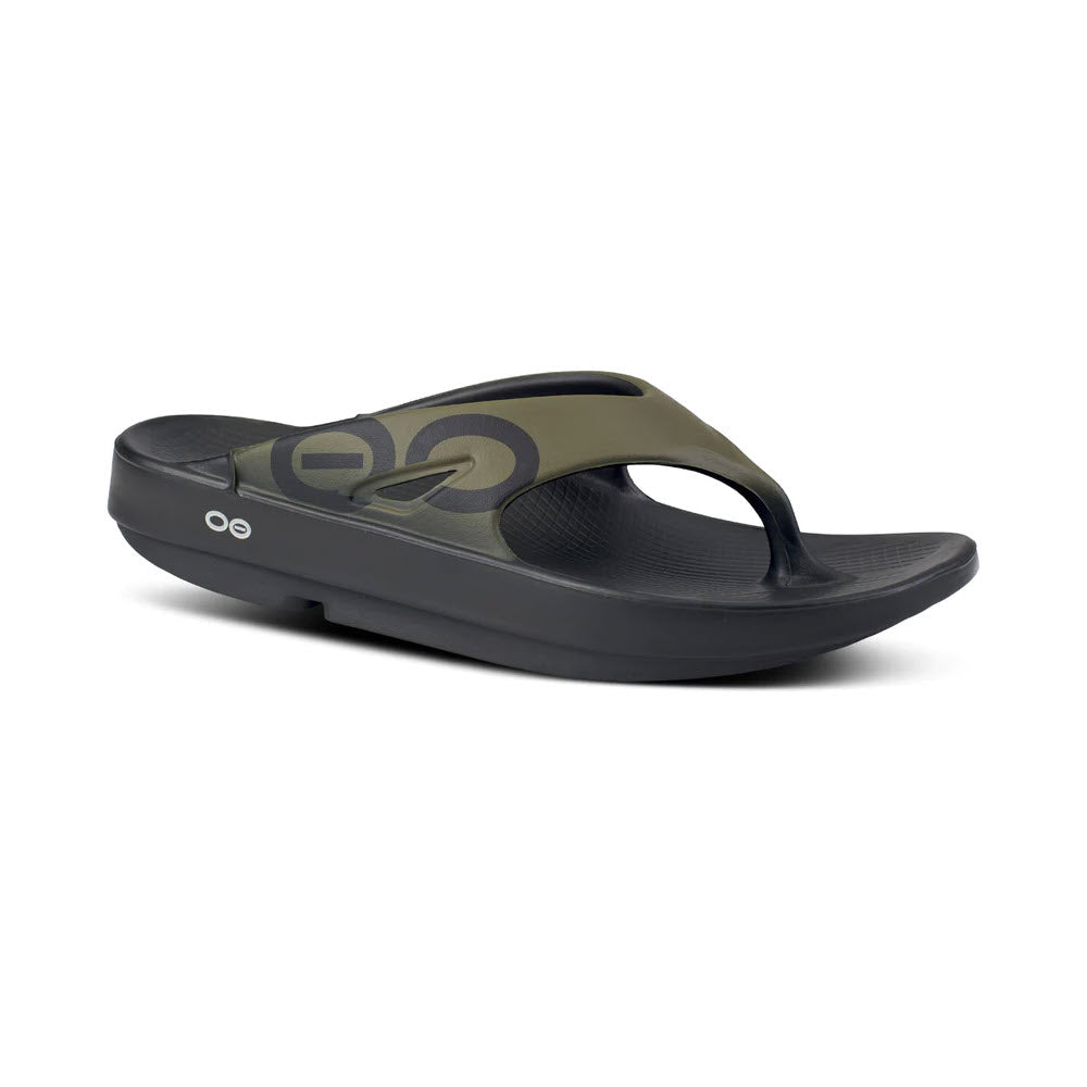 A single black and olive green flip-flop with a thick OOFOS Impact Absorption Technology sole and a logo on the strap, isolated on a white background.