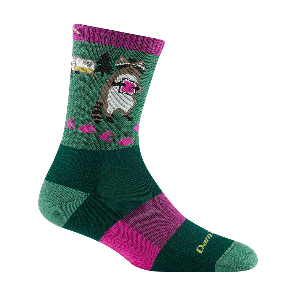 A Darn Tough Critter Club Crew Sock in Moss for women featuring a cartoon racoon and pink mushrooms, with purple accents on the toe and cuff.
