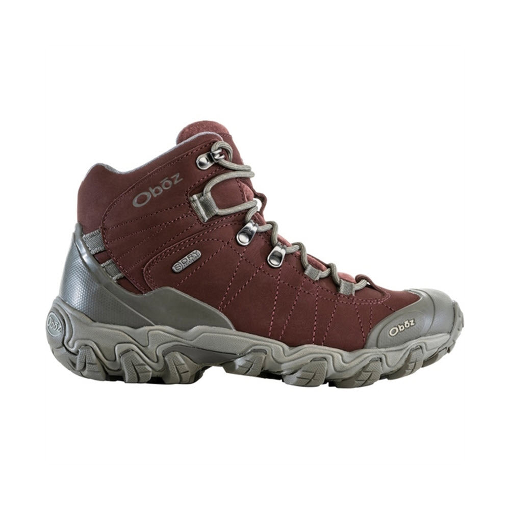 A single maroon and gray OBOZ BRIDGER MID B-DRY PORT hiking boot isolated on a white background.