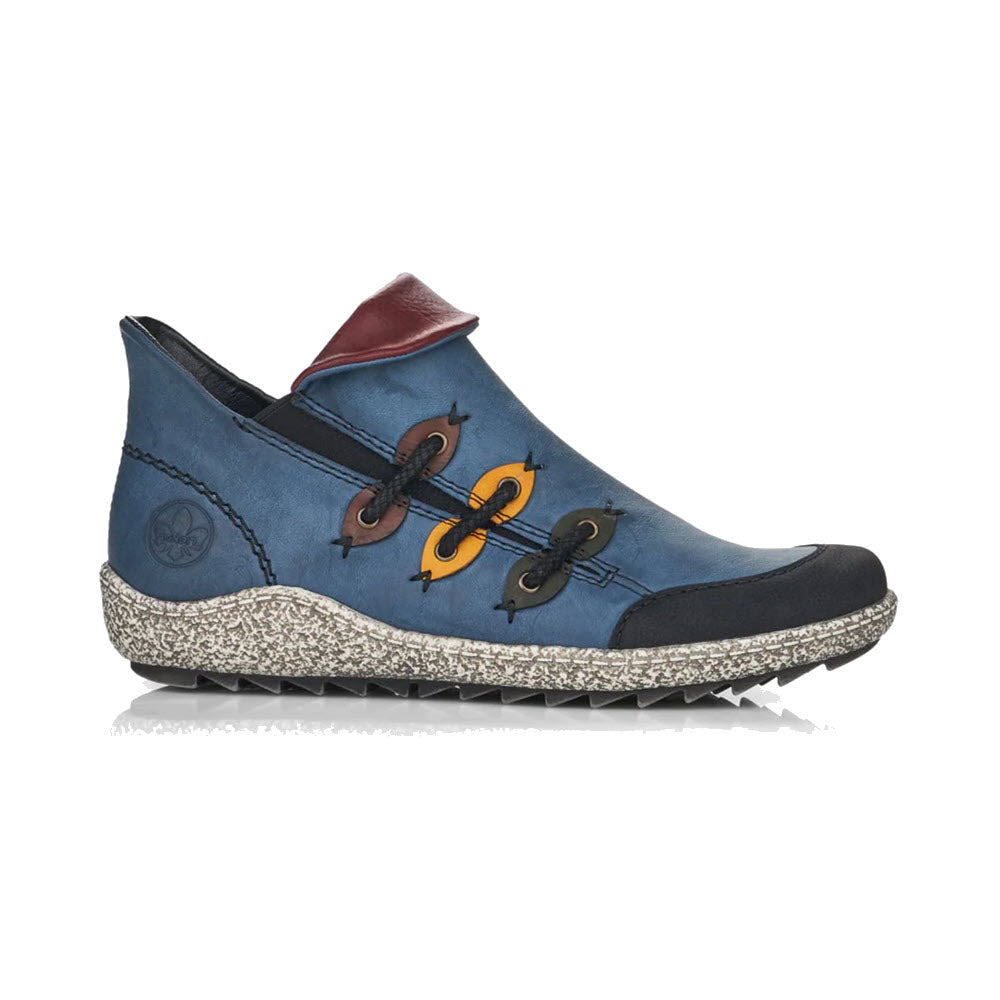 A blue leather slip-on shoe with a textured sole, red tongue, black toe cap, and decorative colorful stitching loops on the side.