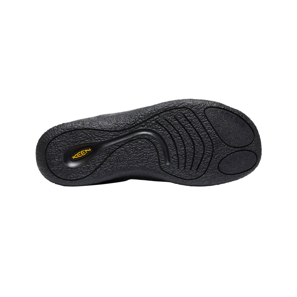 Sole of a black Keen Howser III Slide Charcoal Grey Felt - Mens hybrid slip-on shoe with textured design and brand logo visible.