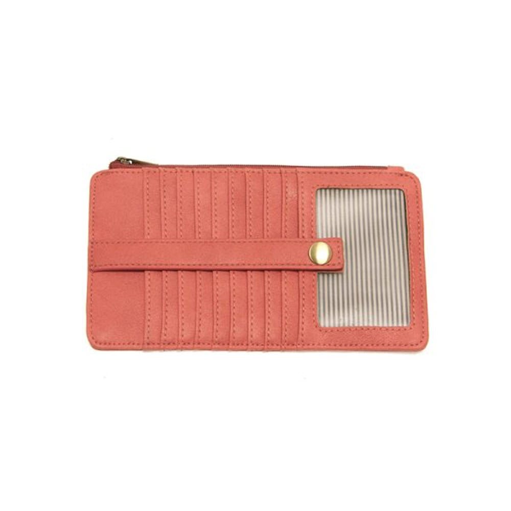 JOY NEW KARA MINI WALLET CORAL by Joy Susan with ribbed texture and a metallic clasp, displayed against a white background.