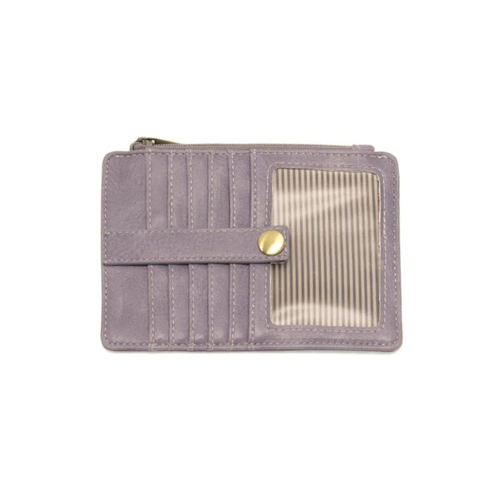 A small, gray Joy Susan New Penny Mini Wallet Amethyst with a ribbed texture and a golden snap button, featuring a zipper and a clear ID window on a white background.