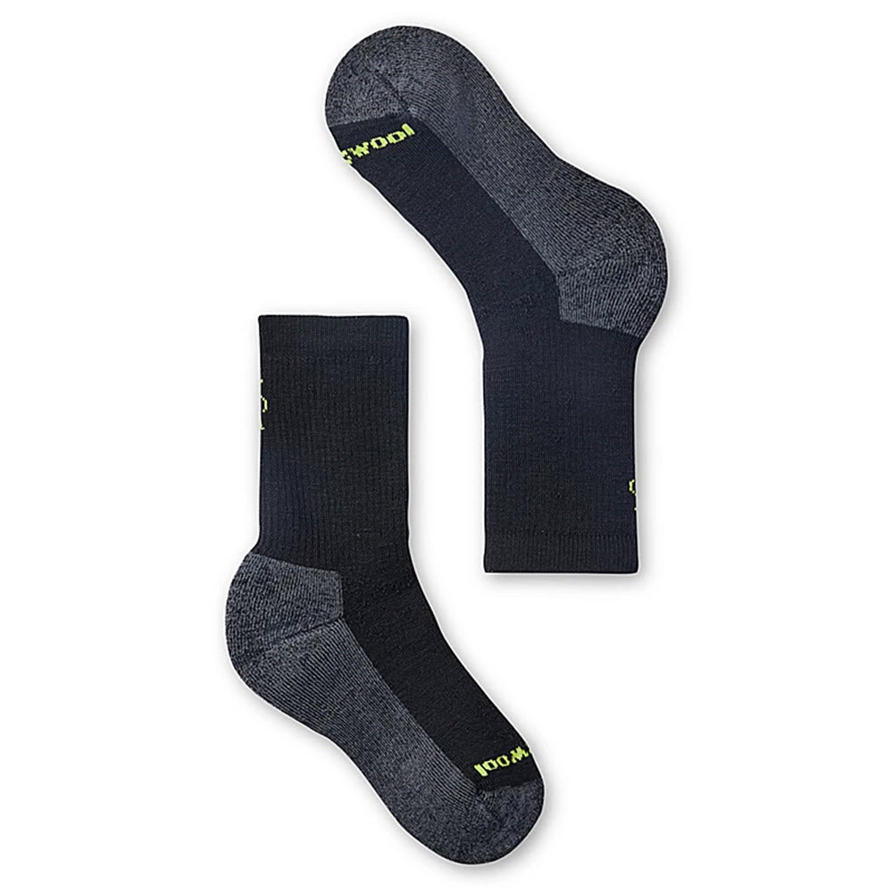 A pair of gray Smartwool Merino socks with reinforced heel and toe areas, labeled with the word &quot;koyd&quot; in yellow lettering.