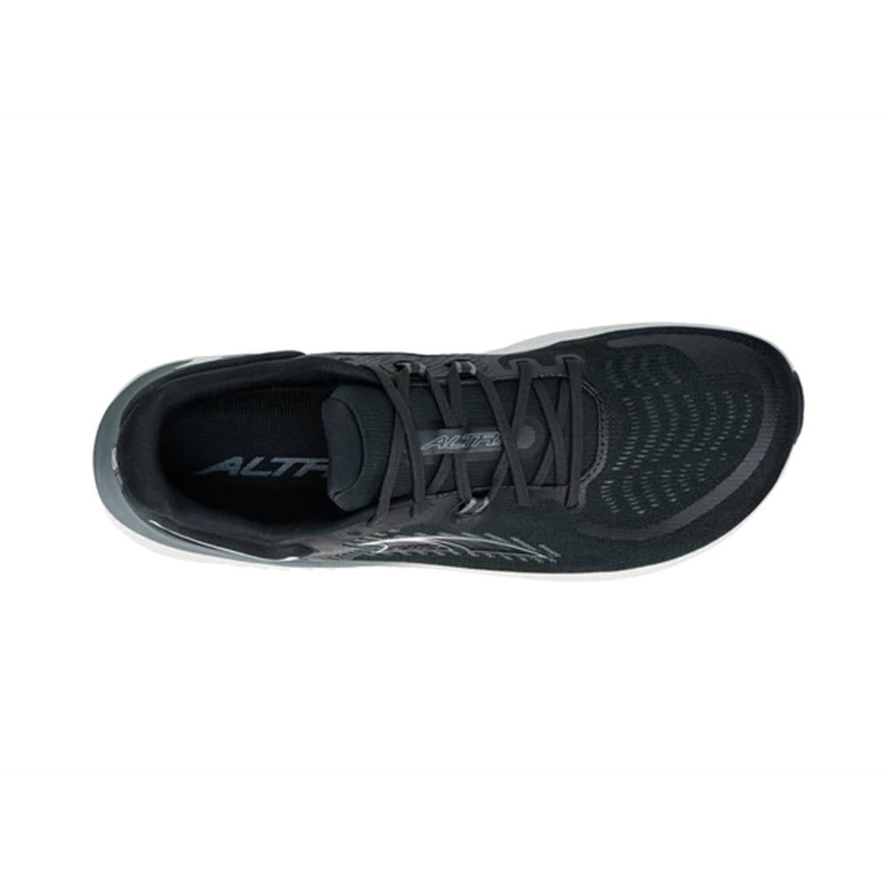 Top view of a single black Altra Paradigm 7 - Mens running shoe with laces on a white background.