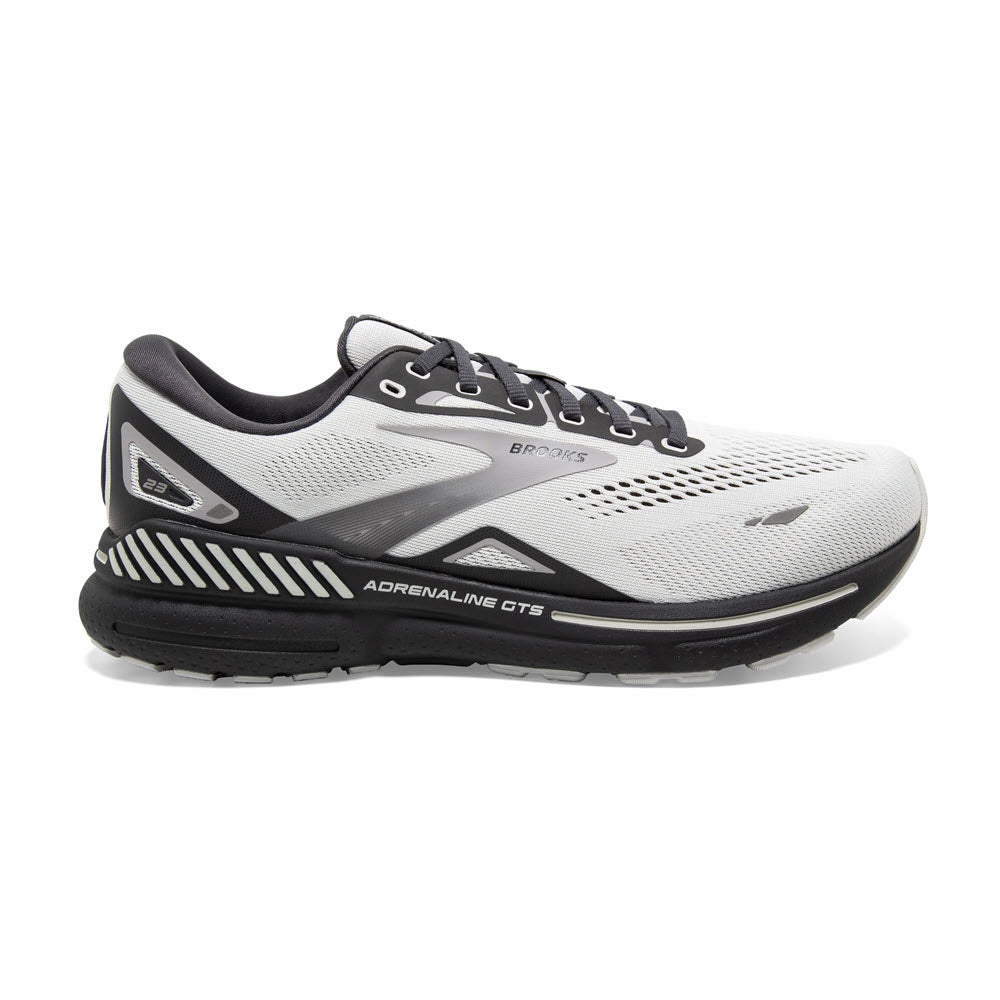 A single white and black Brooks Adrenaline GTS 23 OYSTER/EBONY/ALLOY - Mens stability running shoe against a white background.