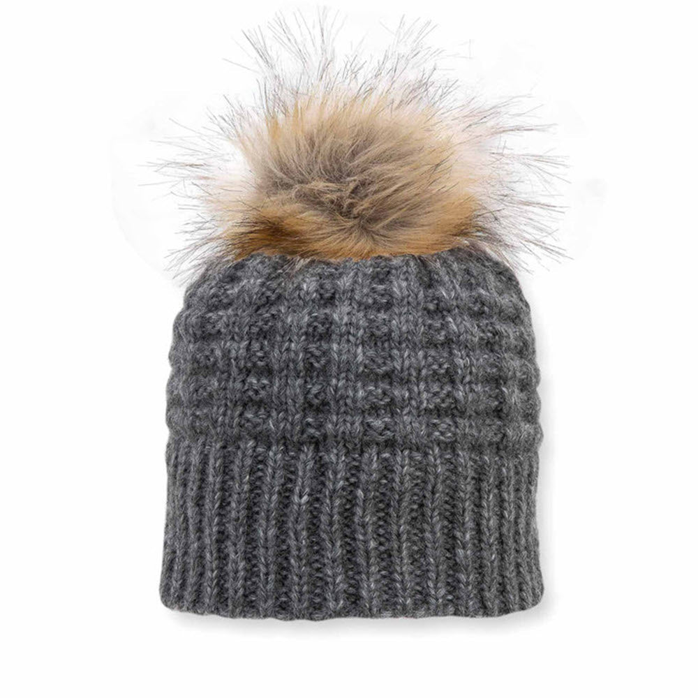 Gray Pistil Cami knit hat with a fluffy faux fur pom-pom on a white background.