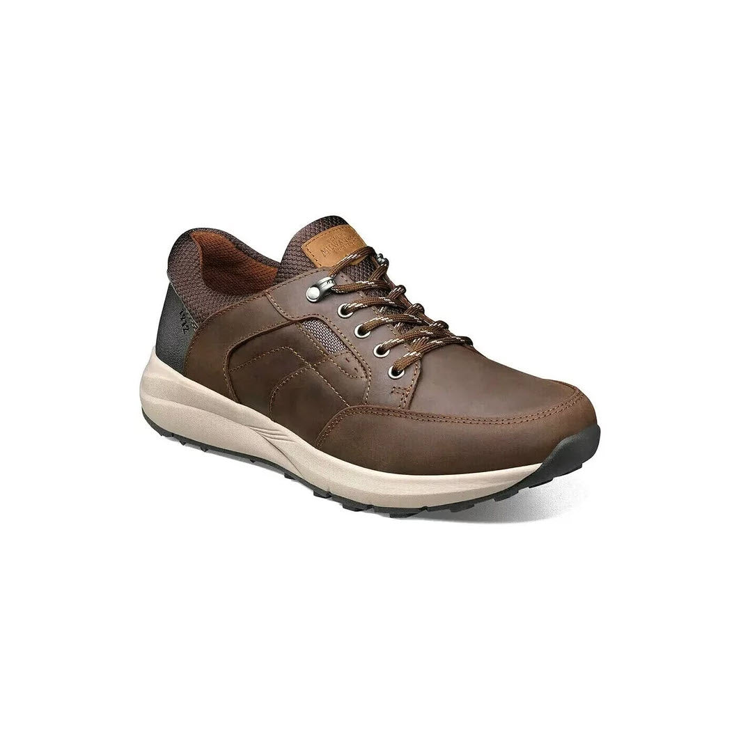A single brown men&#39;s Nunn Bush Excursion Moc Toe Oxford Crazy Horse sneaker with grey and orange details, displayed against a white background.