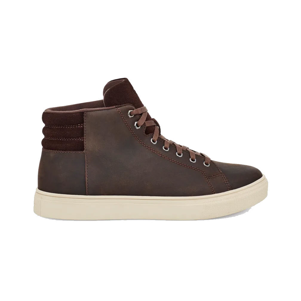 A brown waterproof UGG Baysider High Weather sneaker in grizzly leather with lace-up front and a cream-colored sole, isolated on a white background.