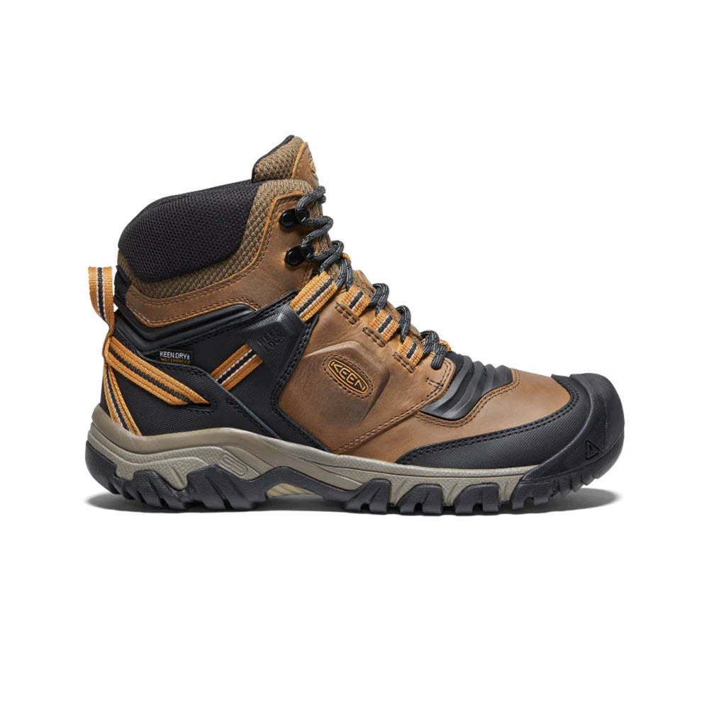 A single KEEN RIDGE FLEX MID WP BISON/GOLDEN BROWN hiking boot with orange accents and rugged tread, displayed against a white background.