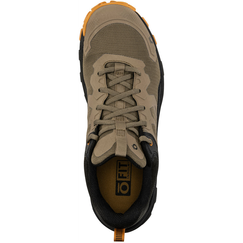Top view of a single beige and black Oboz Katabatic Low Thicket hiking shoe with laces and a visible sole tread pattern.
