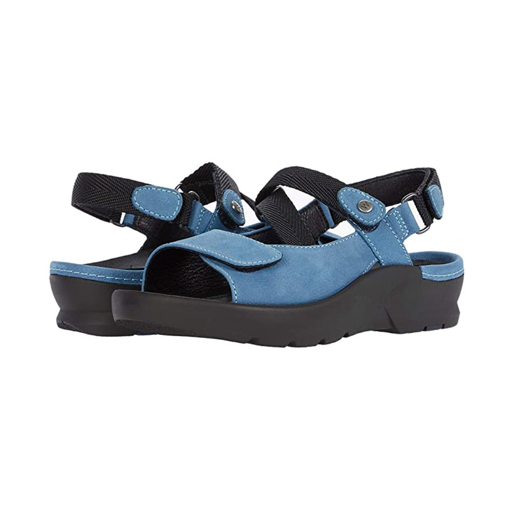 A pair of Wolky Lisse Baltic Blue - Womens sport sandals with adjustable straps and a memory foam insole, displayed against a white background.