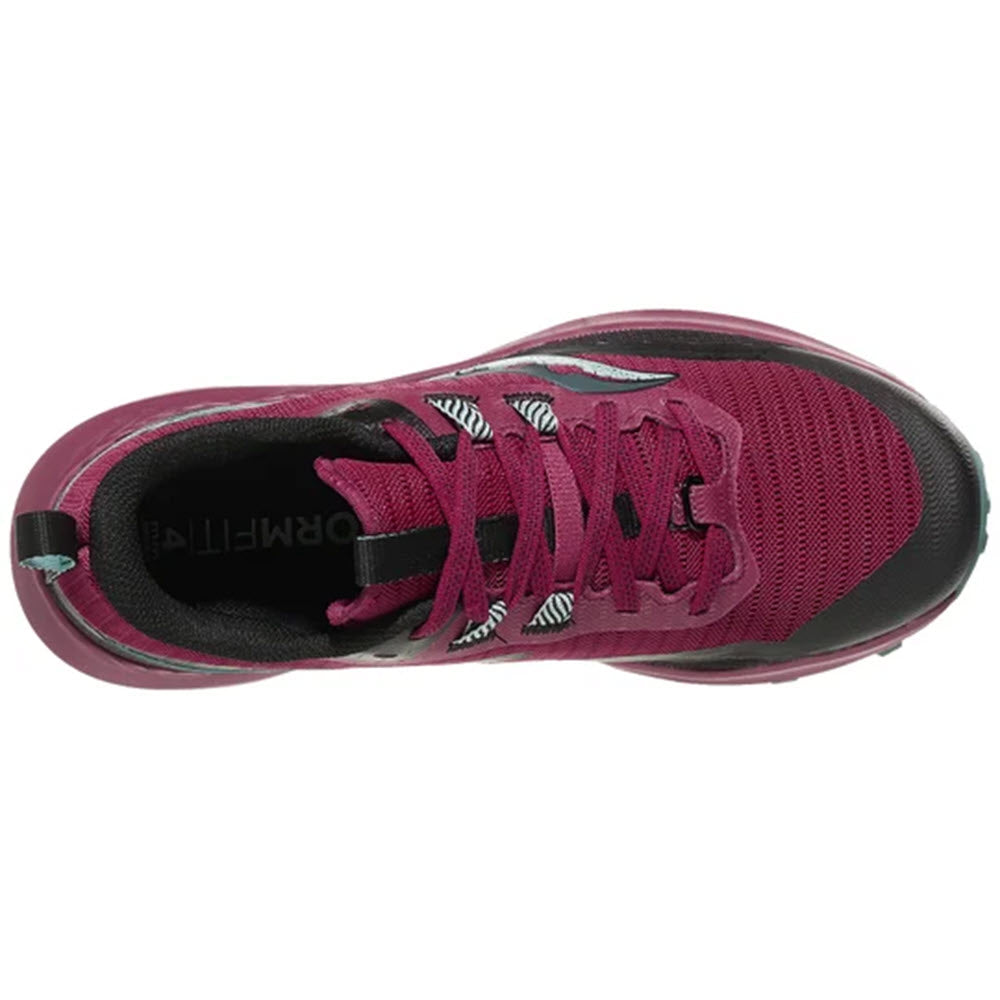 Top view of a Saucony Peregrine 13 Berry/Mineral trail running shoe in pink and black with laced-up front and visible logo on the insole.