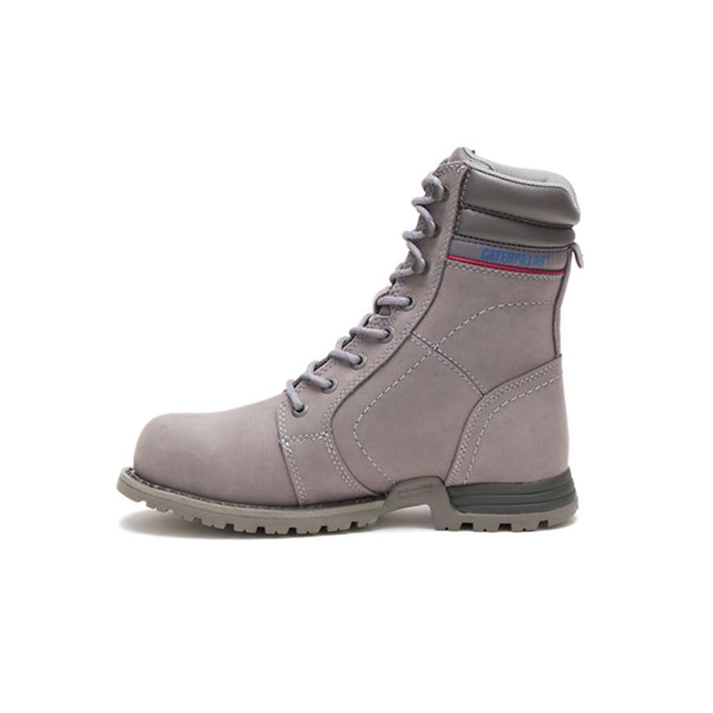 A single Caterpillar women’s work boot in Frost Gray with laces, featuring a rugged sole and a small blue and red brand label near the top.