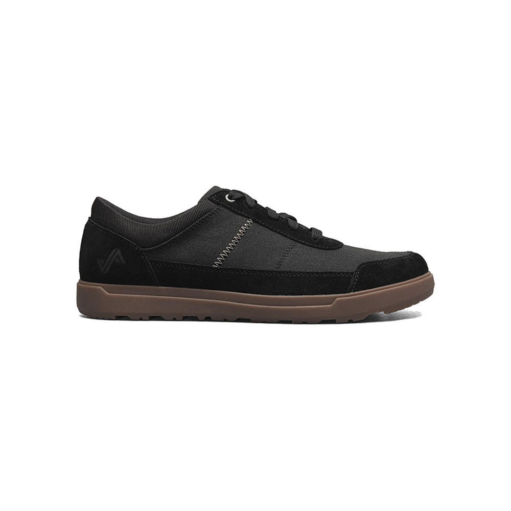 A Forsake black sneaker with a brown sole and subtle branding on the side, featuring a Memory Foam footbed, isolated on a white background.