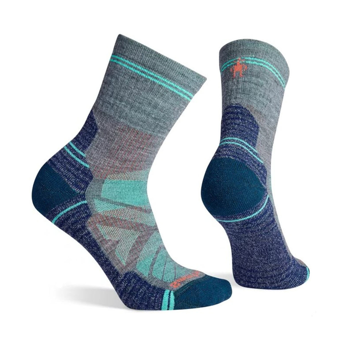 Two multi-colored Smartwool Hike Mid Crew socks standing upright against a white background, featuring shades of blue, gray, and orange with geometric patterns.
