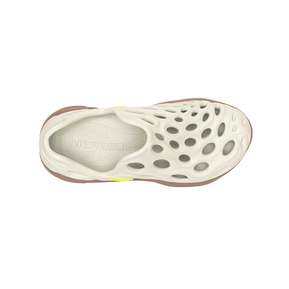 Single silver/antler Merrell Hydro Next Gen Moc slip-on shoe with large circular perforations, displayed against a white background.