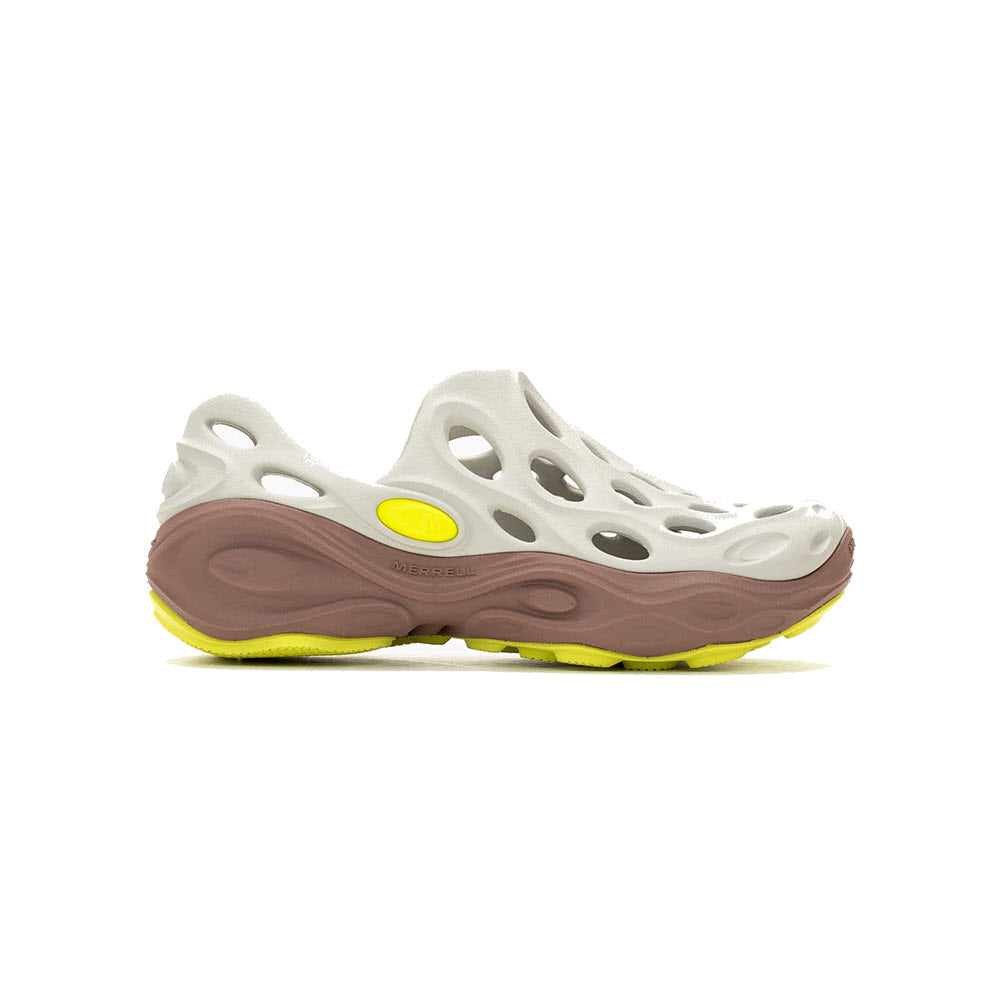 A single MERRELL HYDRO NEXT GEN MOC SILVER/ANTLER hiking boot with multiple holes on the sides and a yellow accent, displayed against a white background.