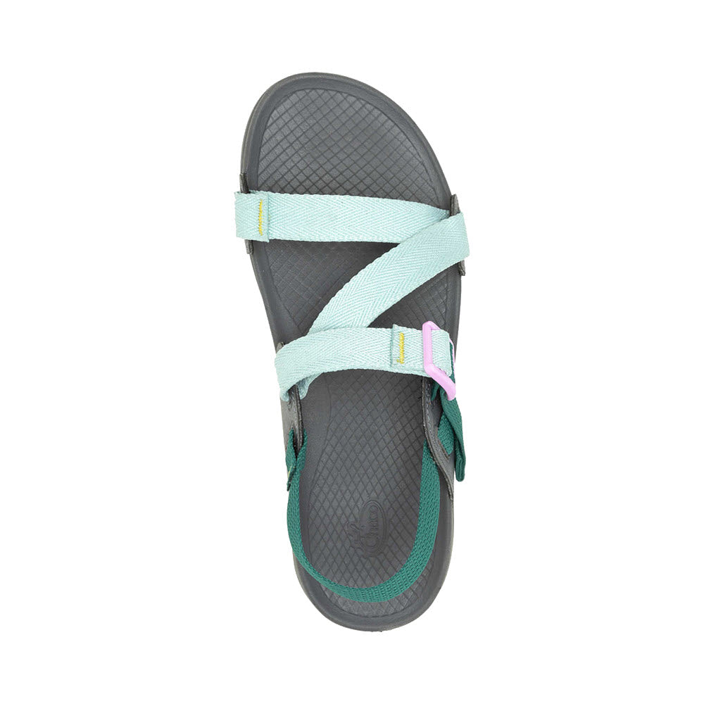 A single lightweight Chaco Lowdown Sandal Surf Spray - Women with green straps and a textured insole, viewed from above, isolated on a white background.